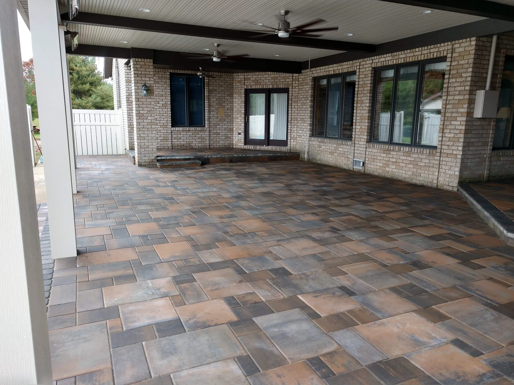 Newly completed covered paver patio by Dave's Landscaping